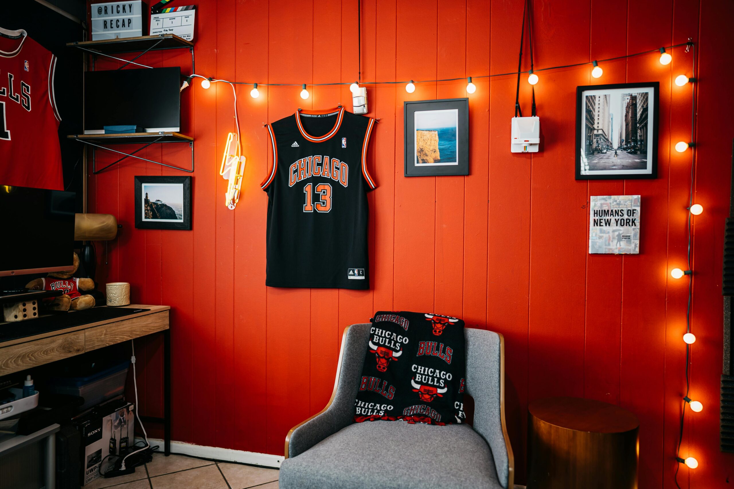 Cozy indoor space with Chicago Bulls memorabilia and vibrant red walls.